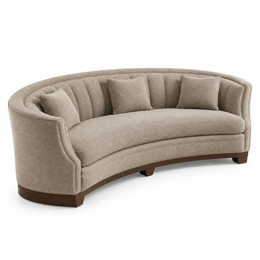 Beige curved sofa by wetandwestcoast with plush cushions and sleek design, perfect for modern living rooms.